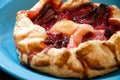 Strawberry pastry on a blue plate Royalty Free Stock Photo