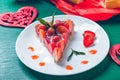 Strawberry pie on white plate green wooden table. One piece. Romantic. Love. Heart. Toned photo. Royalty Free Stock Photo