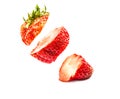 Strawberry in pieces in the air. sliced strawberry floating on air isolated on white background Royalty Free Stock Photo