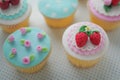 Strawberry fondant cup cakes. Royalty Free Stock Photo