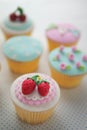 Strawberry fondant cup cakes. Royalty Free Stock Photo