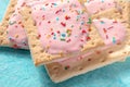Strawberry pop tart close-up on a blue background Royalty Free Stock Photo