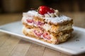 Strawberry puff mille-feuille with cherry Royalty Free Stock Photo