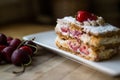 Strawberry puff mille-feuille with cherry Royalty Free Stock Photo