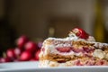 Strawberry puff mille-feuille with cherry Royalty Free Stock Photo