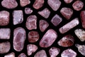 Strawberry quartz rare stones texture on black background