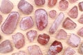 Strawberry quartz rare stones texture on light varnished wood background