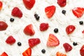 Strawberry, raspberry and blueberry in sweet whipped cream Royalty Free Stock Photo