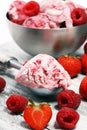 Strawberry and raspberry ice cream scoop with chopped nuts and w Royalty Free Stock Photo