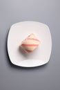 Strawberry roll cake on a gray background. Top view Royalty Free Stock Photo