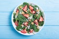 Strawberry salad with spinach cheese and walnut . Healthy food