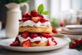 Strawberry shortcake on plate in kitchen