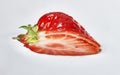 Strawberry shot from below on white background. Royalty Free Stock Photo