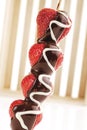 Strawberry skewer with chocolate icing