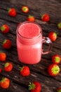 Strawberry smoothie in jar glass on wooden table. healthy food concept for breakfast or snack. Royalty Free Stock Photo