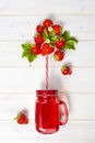 Strawberry smoothie in mason jar with straw Royalty Free Stock Photo