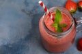 Strawberry smoothies with banana and orange juice in a glass jar Royalty Free Stock Photo