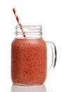 Strawberry smoothies with banana and strawberries in a glass jar Royalty Free Stock Photo