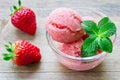 Strawberry sorbet in glass on a wooden table Royalty Free Stock Photo