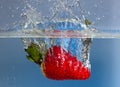 Strawberry splash in water Royalty Free Stock Photo