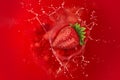 Strawberry splash into juice Royalty Free Stock Photo