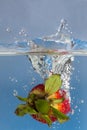 Strawberry splash in water Royalty Free Stock Photo