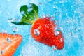 Strawberry splash in water- top view Royalty Free Stock Photo