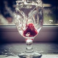 Strawberry Splashing in Glass of Water in Heart Shape Royalty Free Stock Photo