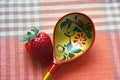 Strawberry and a spoon