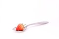 Strawberry on spoon