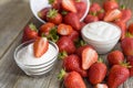 Strawberry sugar and yogurt on a wooden table. Royalty Free Stock Photo