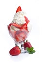 A strawberry sundae topped with whipped cream