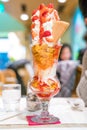 Strawberry sundae tower ice-cream with whip cream and strawberry sauce Royalty Free Stock Photo