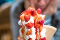 Strawberry sundae tower ice-cream with whip cream and strawberry sauce Royalty Free Stock Photo