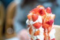 Strawberry sundae tower ice-cream with whip cream and strawberry sauce Royalty Free Stock Photo