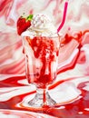 A strawberry sundae with whipped cream and a pink straw