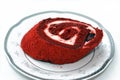 Strawberry Swiss Roll gateau made of rich fluffy spongy cake roll with layers of heavy whipping cream, dried strawberries