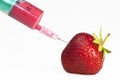 Strawberry with syringe Royalty Free Stock Photo