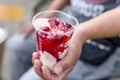 Strawberry Taho, a popular delicacy in Baguio. A soybean curd with strawberry sauce and pieces Royalty Free Stock Photo