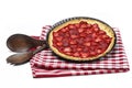 Strawberry tart on checkered red and white table cloth Royalty Free Stock Photo