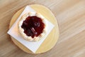 Strawberry tart pie on wooden plate. Royalty Free Stock Photo