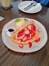 Strawberry Waffle on the wood table