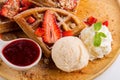 Strawberry waffles whit strawberry sauce and ice cream Royalty Free Stock Photo