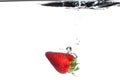 Strawberry in the water splash over white Royalty Free Stock Photo