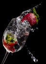 Strawberry Wineglass wine and water splash food and drink Royalty Free Stock Photo