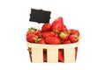 Strawberry in wooden basket with price sign Royalty Free Stock Photo