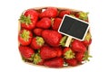 Strawberry in wooden basket with price sign