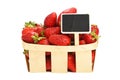 Strawberry in wooden basket with price sign