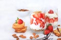 Strawberry yogurt with berries French cracker and muesli on a bright table fruit salad. Healthy breakfast with ingredients