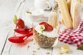 Strawberry yogurt with muesli on a old wooden background Royalty Free Stock Photo